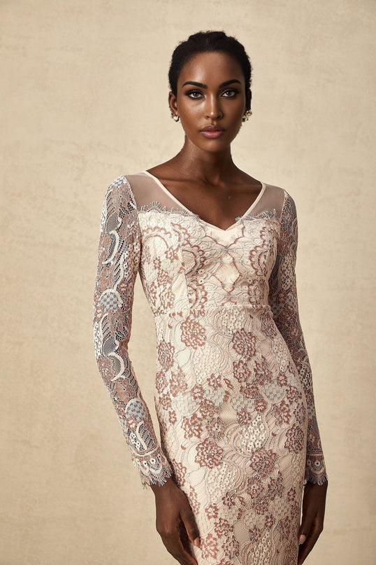 Woman wearing white fitted midi dress with floral guipure lace pattern