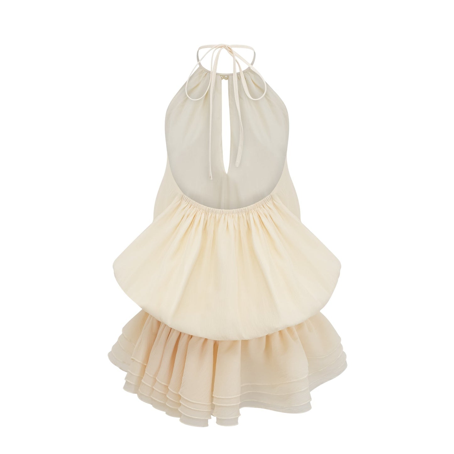 Woman wearing white halterneck mini dress with faux pearl embellishments