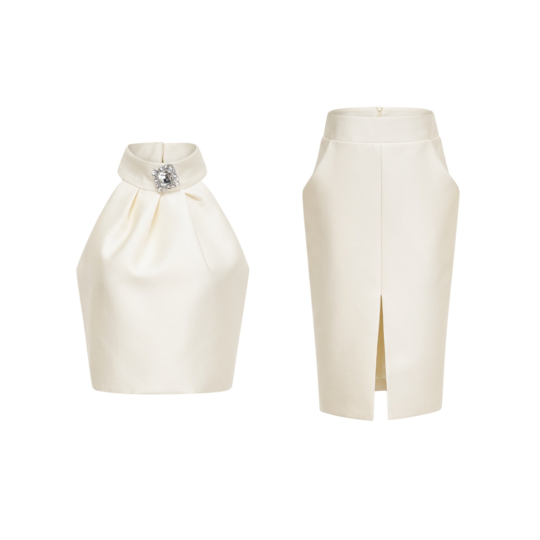 Woman wearing white sleeveless top and matching white skirt standing against plain background