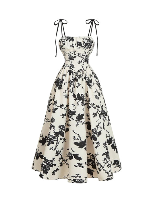 Floral print maxi dress with tie straps and a flowing vintage-inspired silhouette