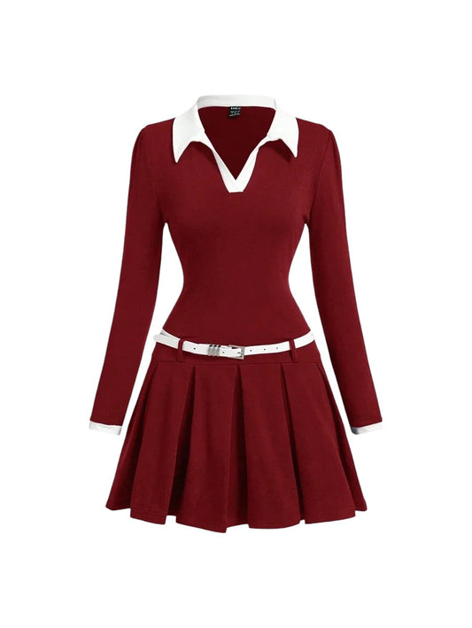 Burgundy contrast collar dress with a pleated skirt, fitted waist, and belt, featuring a polished preppy style with long sleeves and white accents