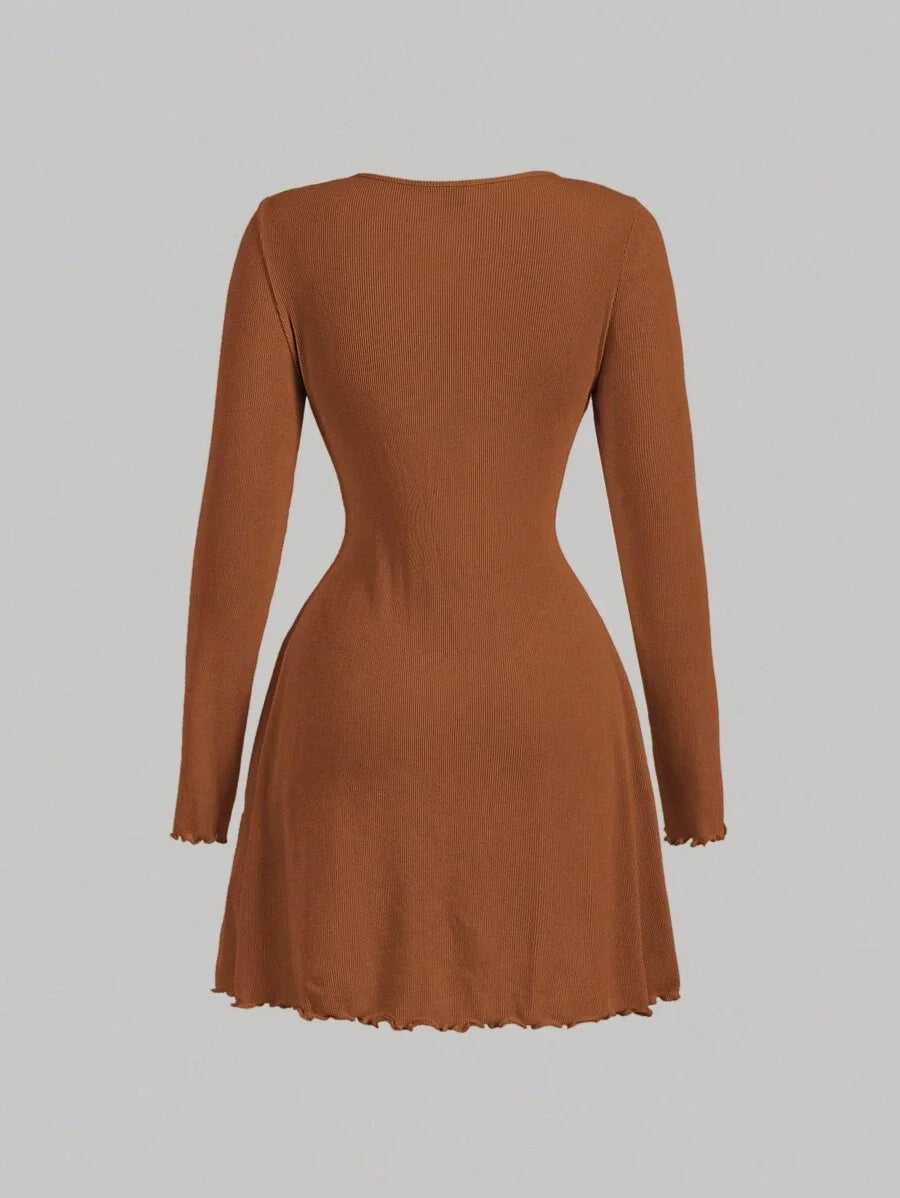 Brown knitted mini dress with pearl buttons, satin bow, and decorative pockets, featuring a tailored fit and ribbed texture for an elegant yet cozy look back side