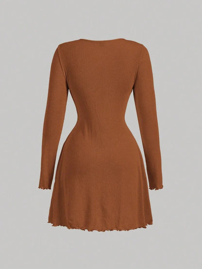 Brown knitted mini dress with pearl buttons, satin bow, and decorative pockets, featuring a tailored fit and ribbed texture for an elegant yet cozy look back side