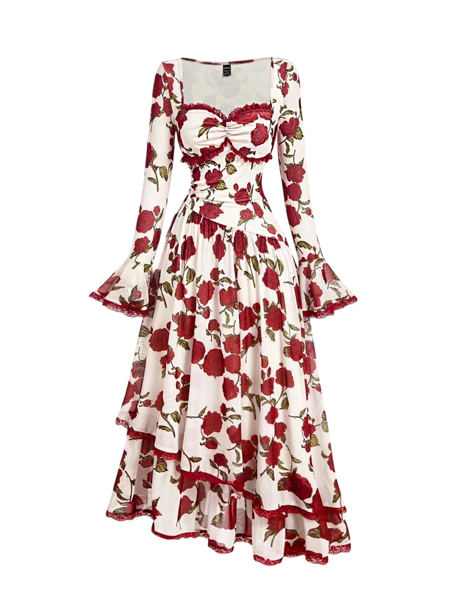 Red floral print tiered dress with bell sleeves, ruffled details, and a flattering fit. Perfect for a romantic and elegant look