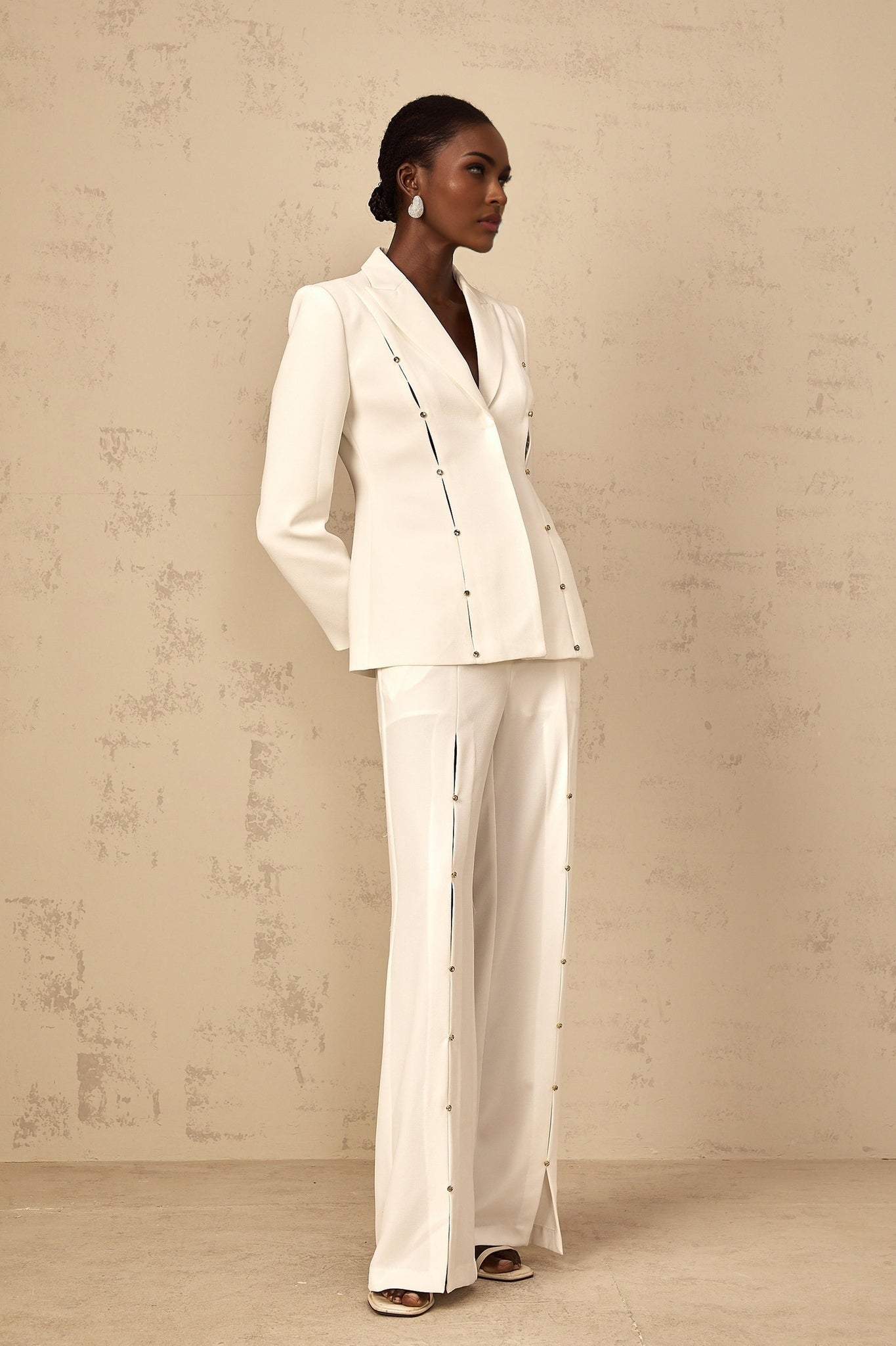 Womens two piece outfit featuring a blazer and trouser pants in matching fabric with embellished details named Frida