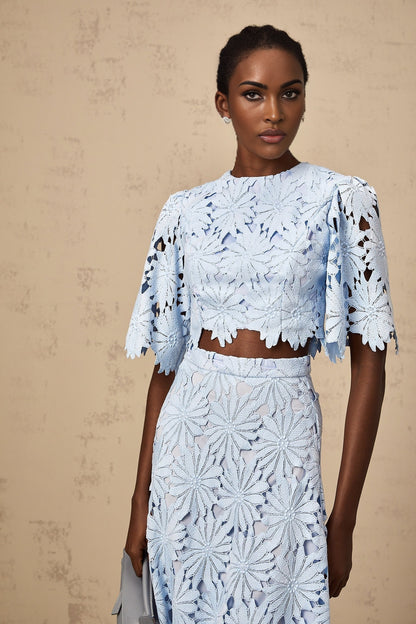 Womens two piece outfit featuring blue lace top and matching skirt in Audrey style