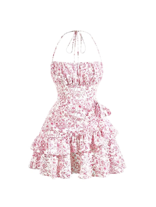 Pink floral halter mini dress with ruched bust, layered ruffled hem, and adjustable tie waist, designed for a romantic and feminine summer look