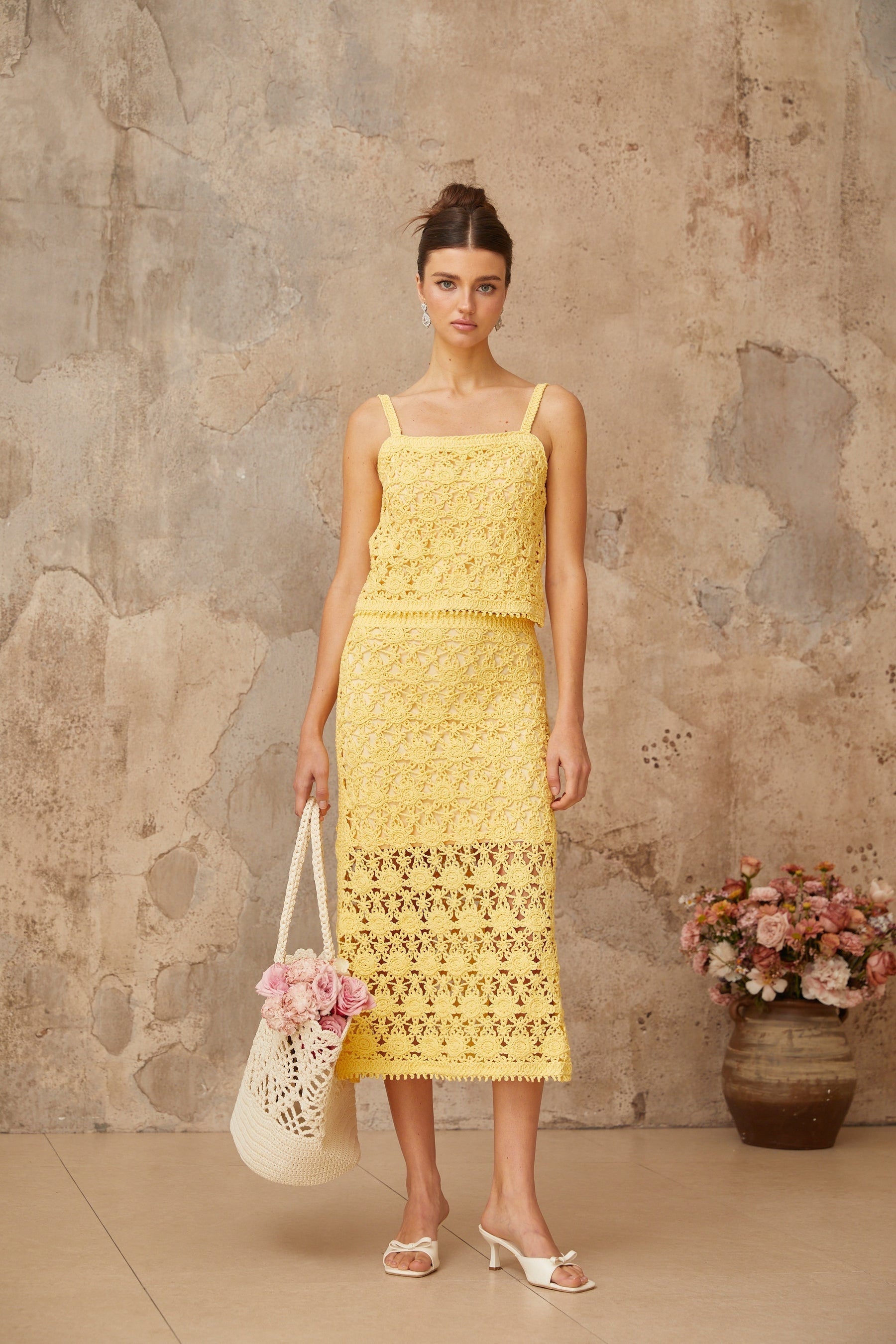 Yellow crochet knit matching set with sleeveless top and skirt Isoline brand summer outfit