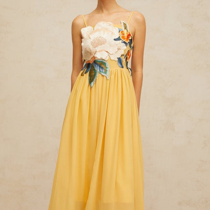 Yellow maxi dress with floral embroidery and shirred details called Josette