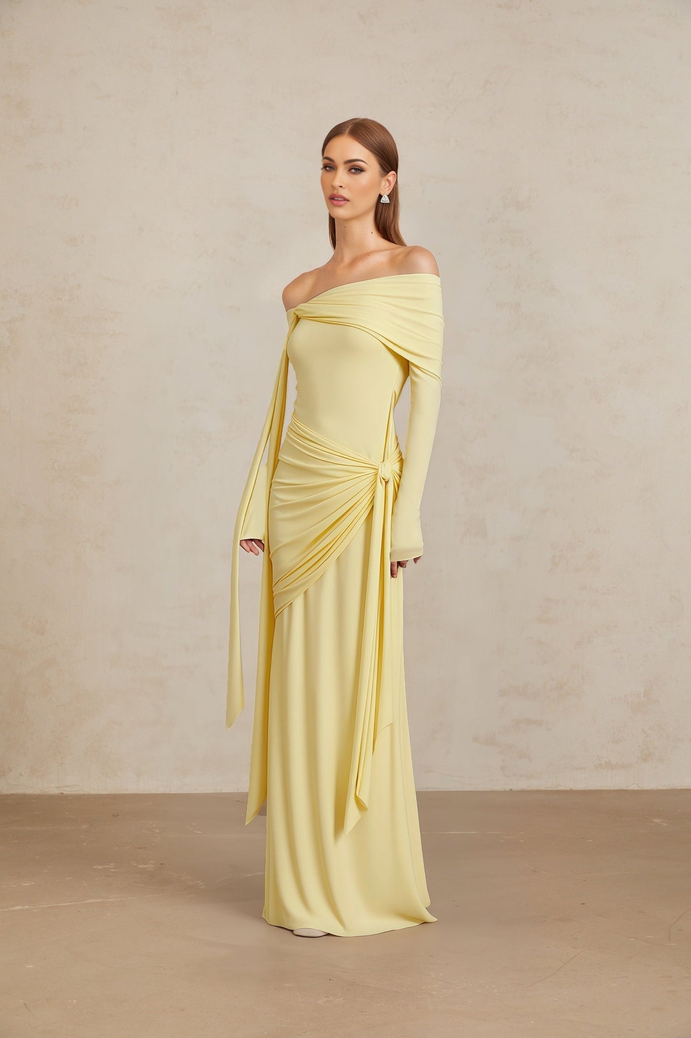 Yellow off the shoulder long sleeve maxi dress with front tie, pleated, asymmetrical design, ruched, and draped detailing