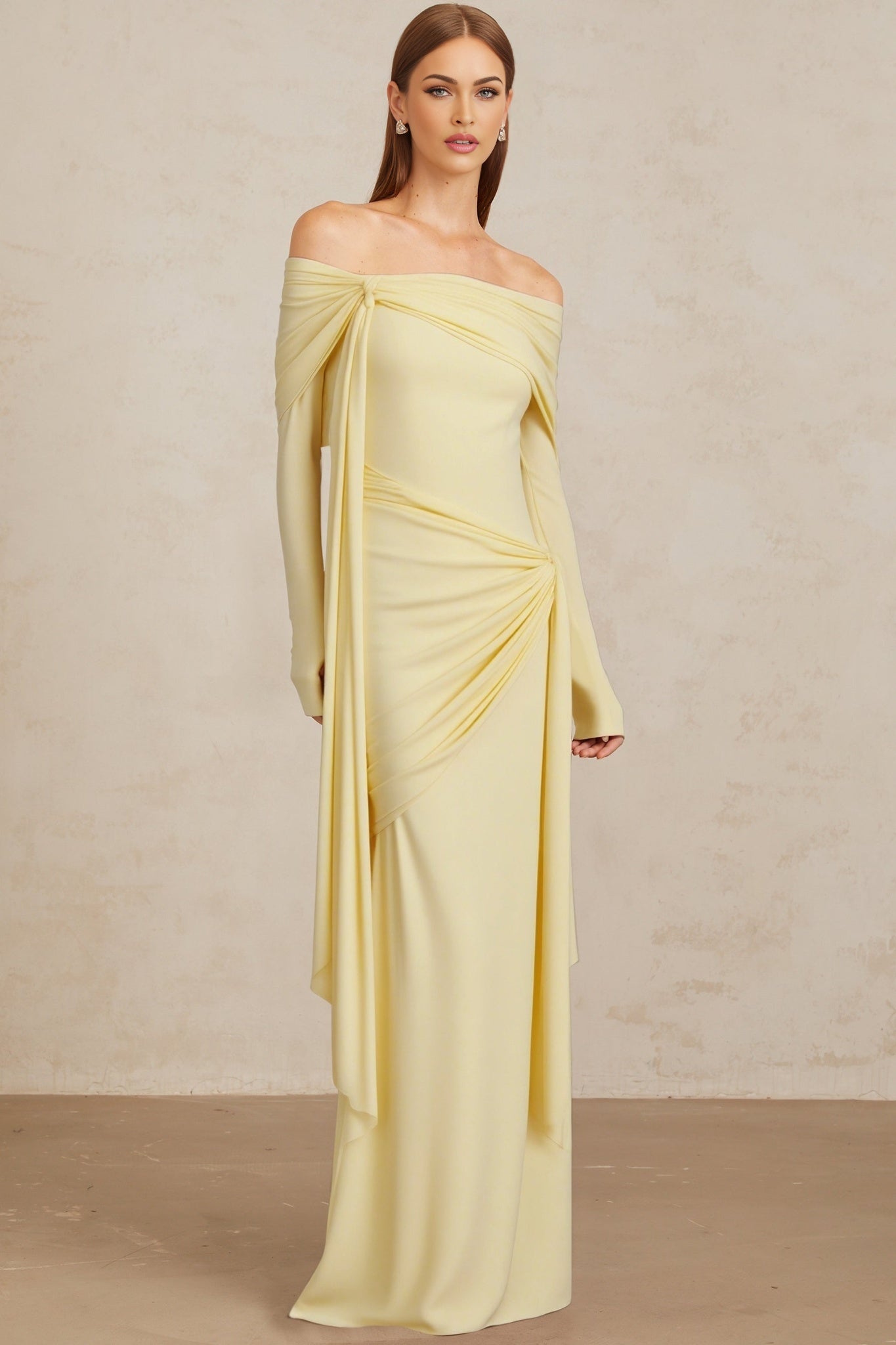 Yellow off the shoulder long sleeve dress with front tie detail and pleated, asymmetrical, ruched, and draped detailing, worn by model 1.77m tall
