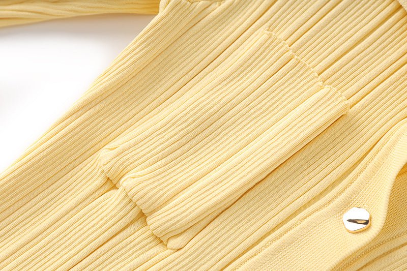 Yellow ribbed knit button-down maxi dress with flared sleeves and front pockets