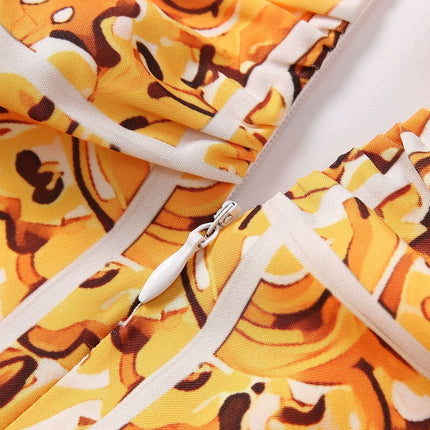 Bright yellow and white baroque pattern halter neck dress