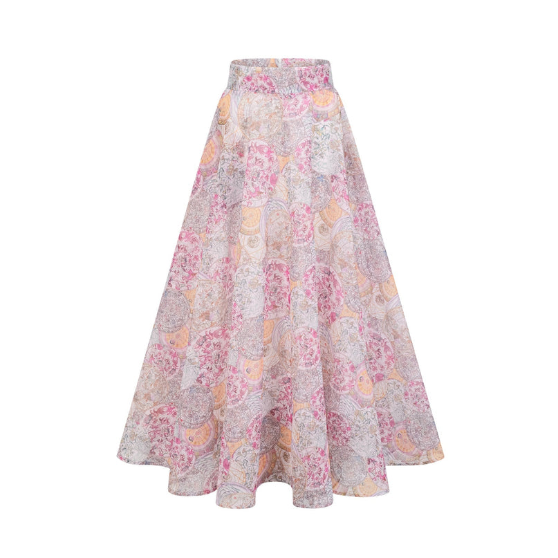 Young girl wearing a cherry pink shirt and skirt set with pattern print design