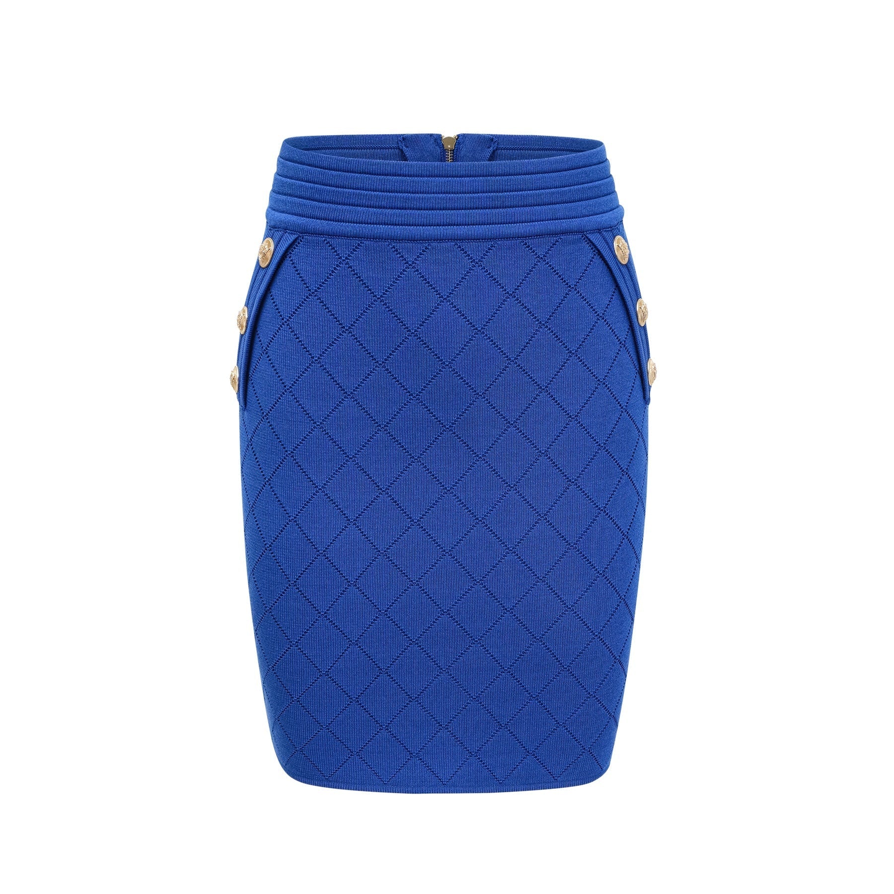 Young woman wearing a blue knitted two piece outfit consisting of a long sleeve top with button details and a matching skirt