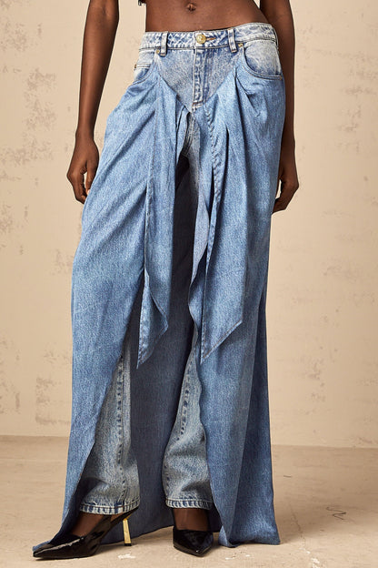 Ysabella blue layered denim jeans featuring multiple tiers of fabric creating a ruffled effect on the legs