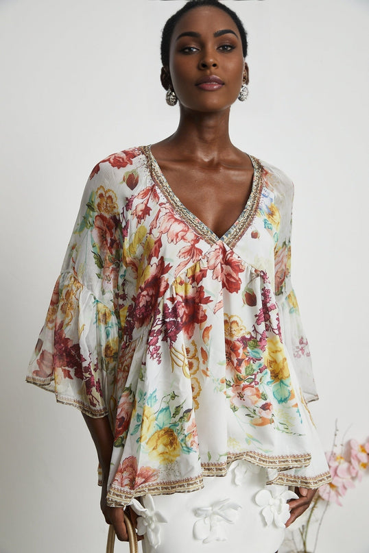 Yvonne White Floral Tulle V-neck Blouse Multicolor Elegant Embellished Trim Bohemian Flared Sleeves Pleated Waist Detail Summer Beach Luxury Fashion