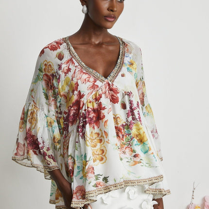 Yvonne White Floral Tulle V-neck Blouse Multicolor Embellished Trim Long Flared Sleeves Pleated Waist Detail