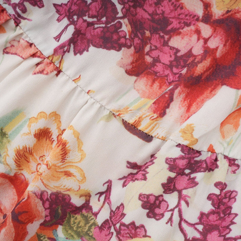 Yvonne White Floral Tulle V-neck Blouse Multicolor Embellished Trim Long Flared Sleeves Pleated Waist Detail