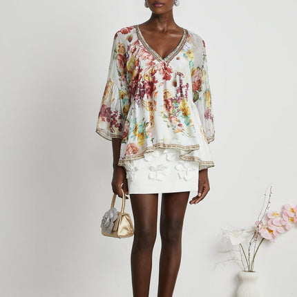 Yvonne White Floral Tulle V-neck Blouse Multicolor Embellished Trim Long Flared Sleeves Pleated Waist Detail