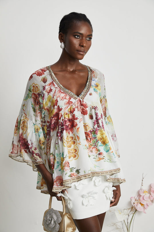 Yvonne Vneck floralprint embellished blouse