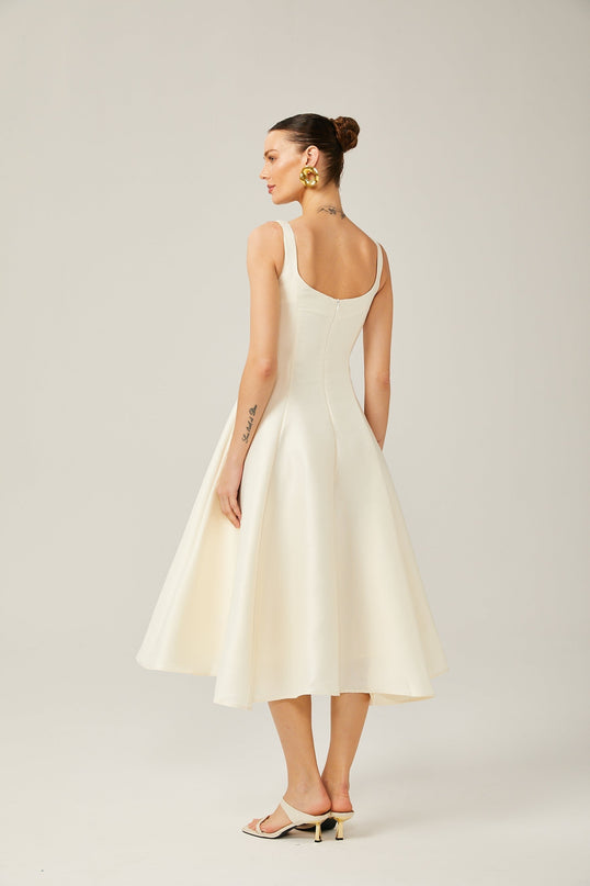 Zaylee Ivory White Satin Midi Dress Square Neck Wide Straps Dart Detailing Pleated Skirt Calf-Length Hemline Rear Zip Fastening Terylene Spandex Blend