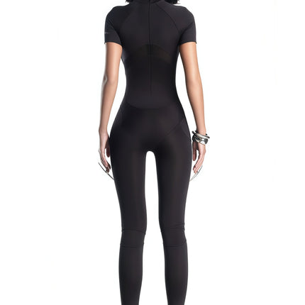 Zéro Black Short Sleeve Catsuit in Opulent Stretch Jersey with Mesh Panel and Rear Zip Fastening